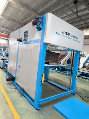 Máy xếp chồng lật tự động tự động hóa việc lật và xếp giấy, tăng năng suất trong sản xuất bìa carton sóng.